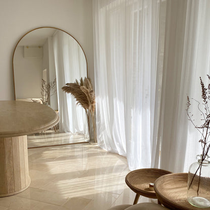 Gold Full Length Arched Metal Mirror in living room