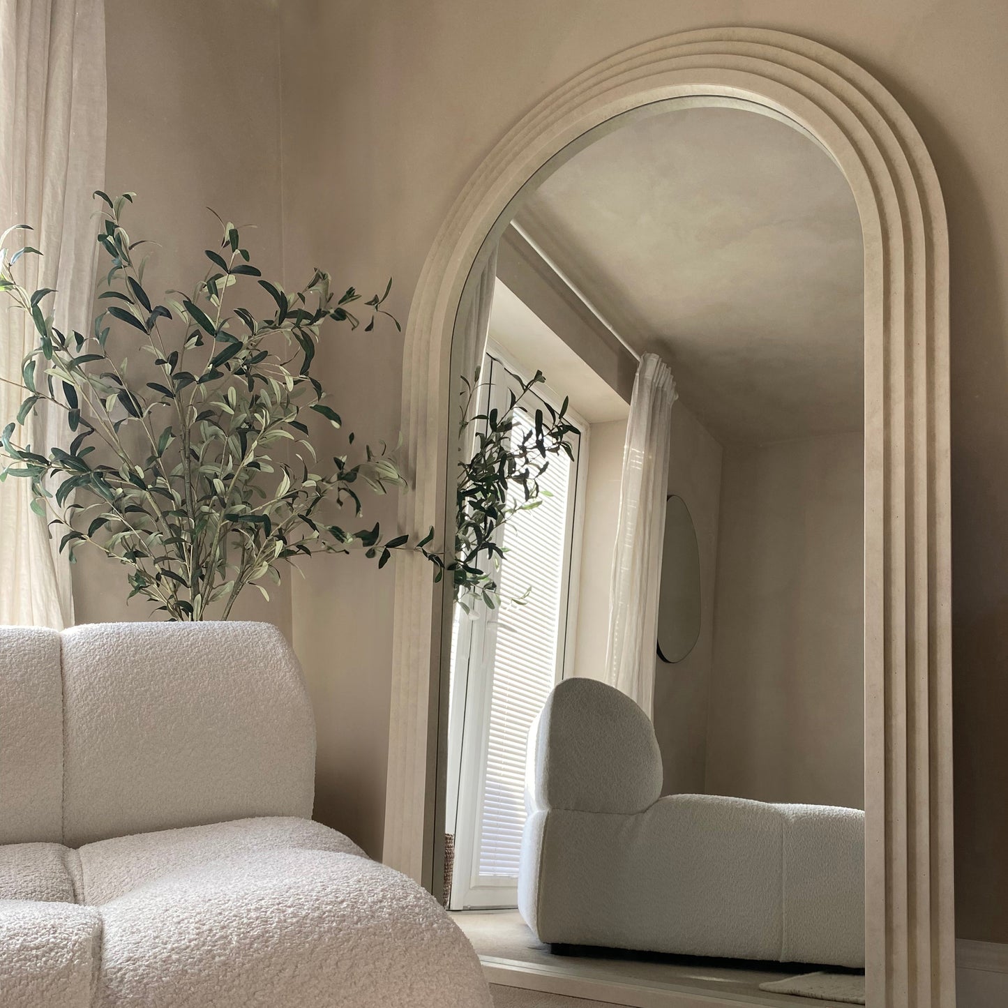 Full Length Arched Concrete Mirror improving natural lighting